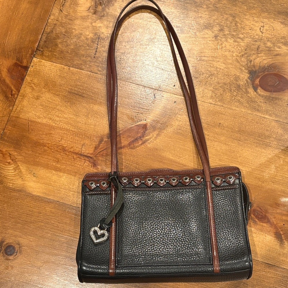 Brighton black and brown leather shoulder bag with heart accents.